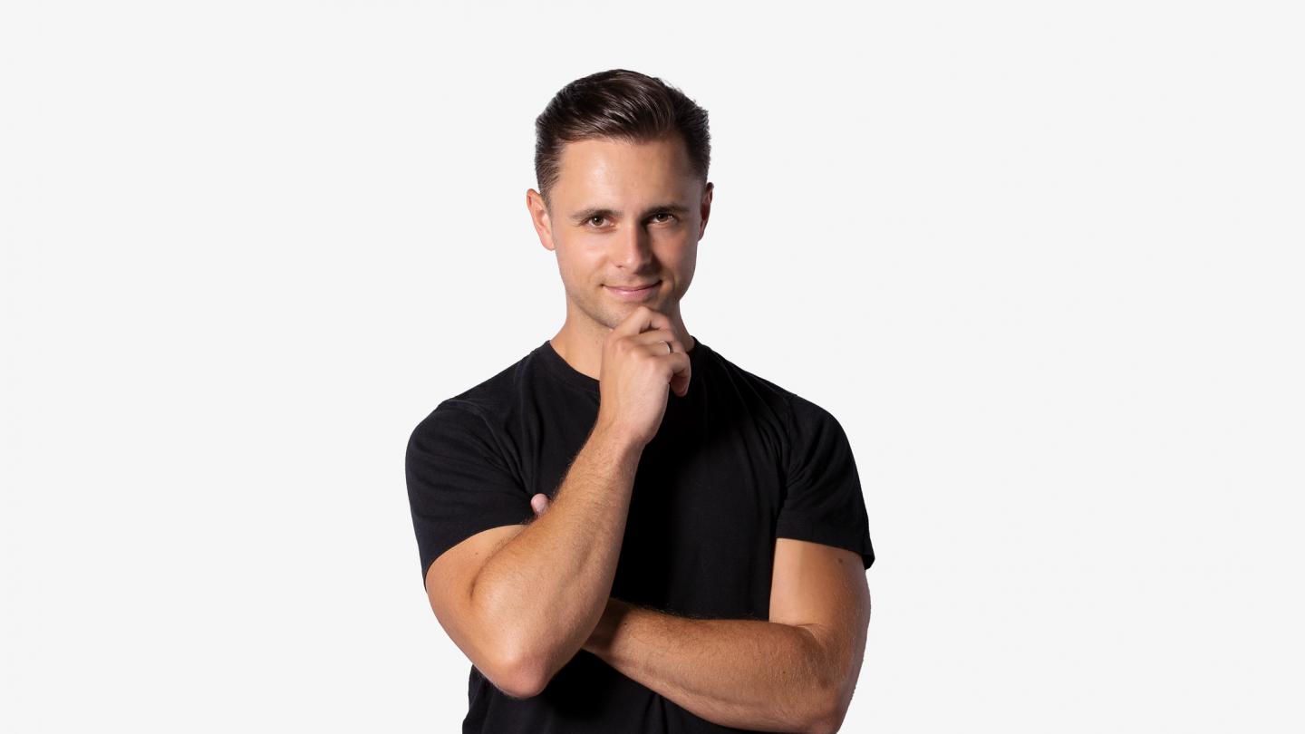 Headshot of male dancer in black t-shirt