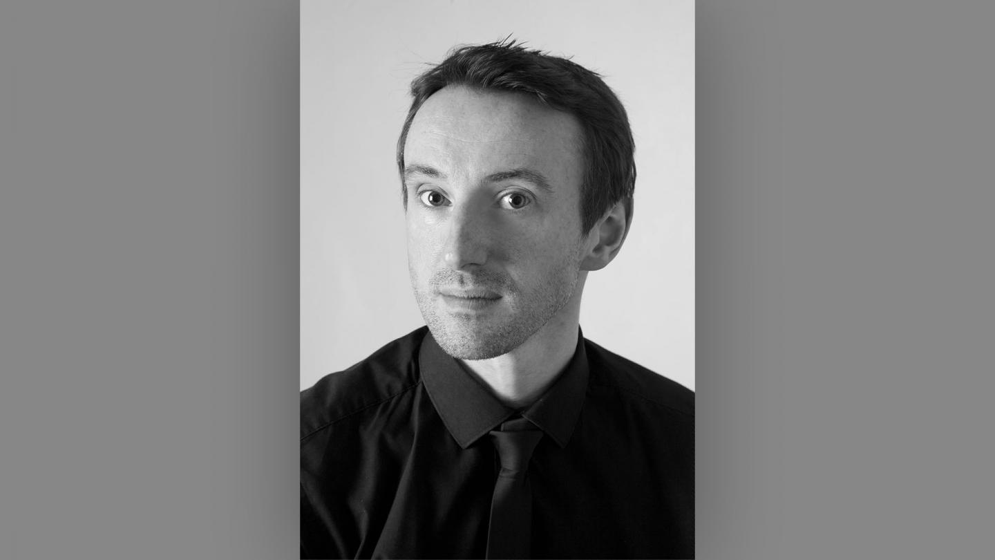 Head shot in black and white of ballroom instructor Howard Bullock