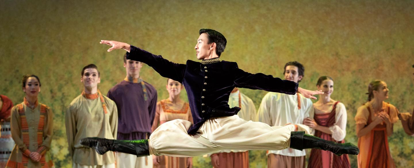 Northern Ballet dancer Matthew Koon as the young Prince leaping through the air as he entertains at the grand picnic. Photo Emma Kauldhar.