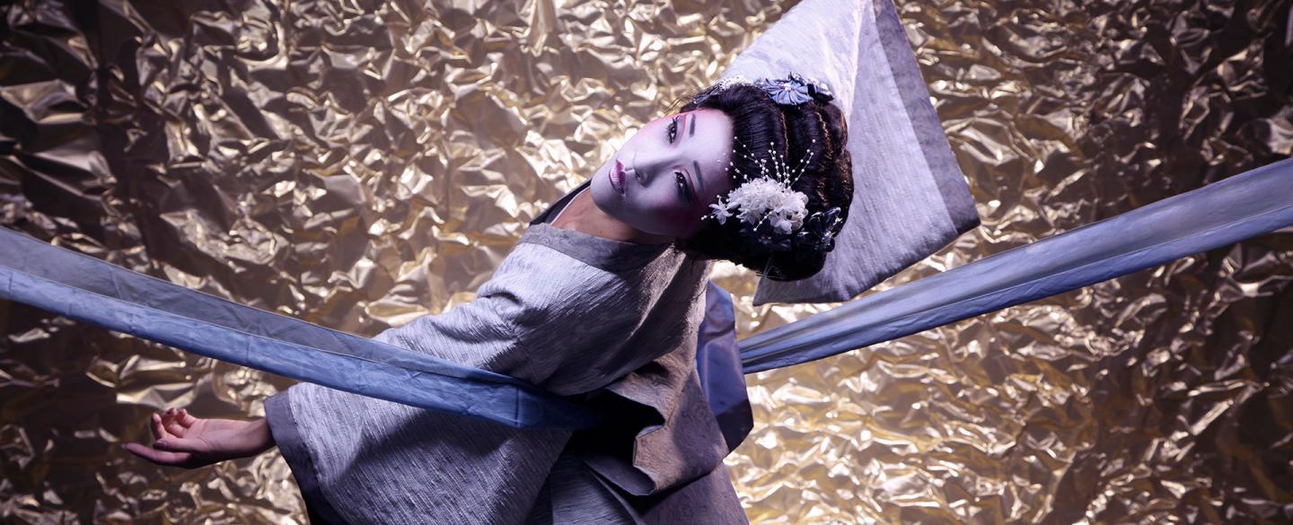 With the ribbon of her bustle stretched beyond the frame, Minju Kang's Geisha holds a stylised pose. Photo Guy Farrow.