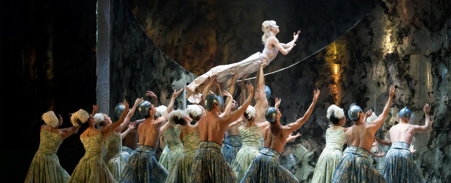 A photo of Northern Ballet dancer Abigail Prudames raised aloft by Northern Ballet dancers in David Nixon OBE's The Little Mermaid. Photo Emma Kauldhar, 2017.