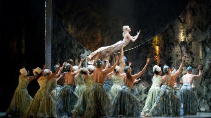 A photo of Northern Ballet dancer Abigail Prudames raised aloft by Northern Ballet dancers in David Nixon OBE's The Little Mermaid. Photo Emma Kauldhar, 2017.