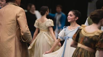 Close-up photo of dancers in costumes